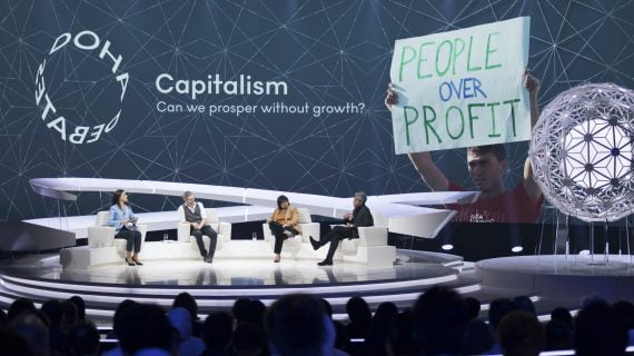 capitalism debate scaled e1594924854547 570 320