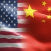 An image showing the flag of the United States and the flag of China converging.