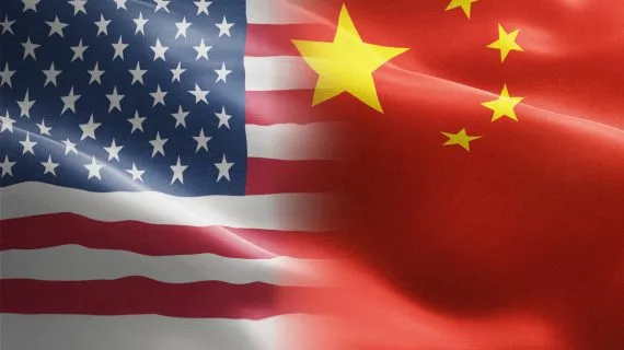 An image showing the flag of the United States and the flag of China converging.